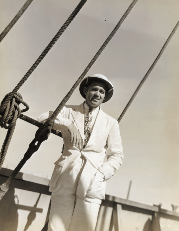 Кларк Гейбл на зніманні фільму «Китайські моря», 1935